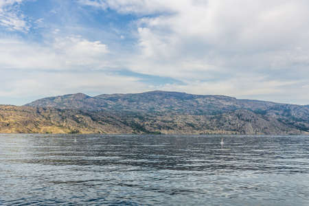 Okanagan lake view at summer time with blue sky british columbia canadaの写真素材