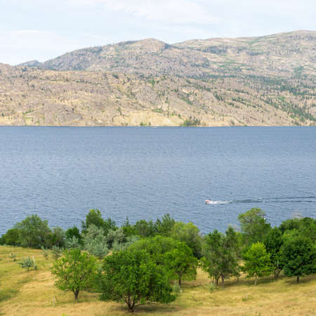 Okanagan lake view at summer time with blue sky british columbia canadaの写真素材