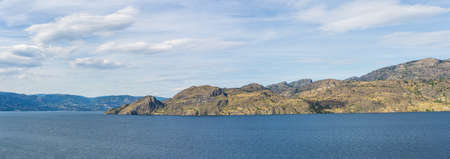 Okanagan lake view at summer time with blue sky british columbia canadaの写真素材