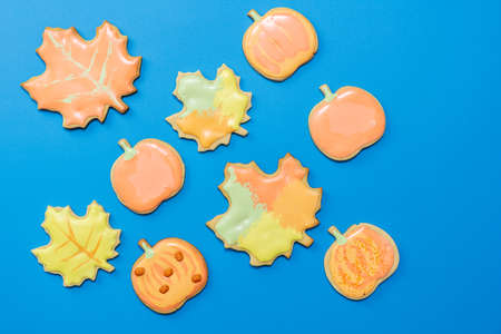 Sweet homemade cookie with icing on dark blue background flat lay compositionの写真素材