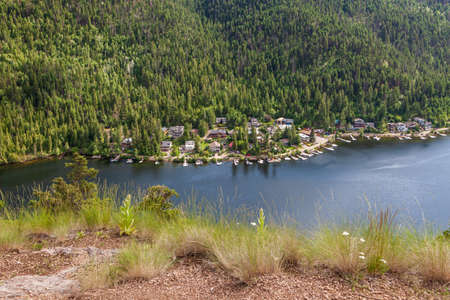 KAMLOOPS, CANADA - JULY 08, 2020: Paul Lake Summer time with green mountains and white clouds british columbia canada.のeditorial素材