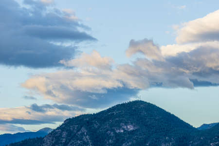 mountains in Okanagan valley and blue sky with cloudsの写真素材