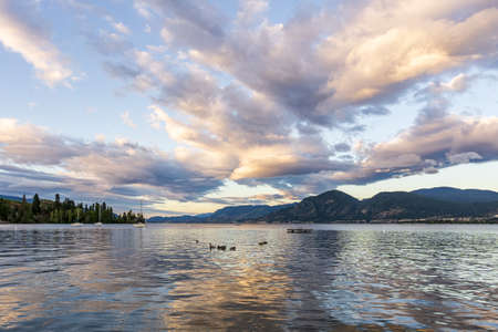 Beautiful lake in British Columbia Canada mountains cloudy morningの写真素材