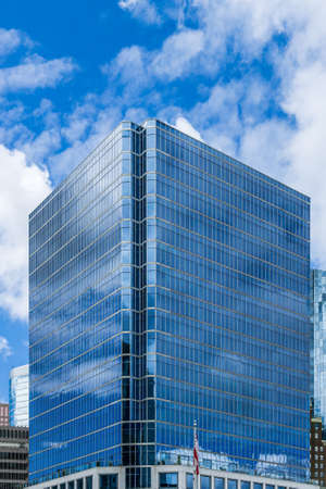VANCOUVER, CANADA - MAY 15, 2020: modern business tall building made from steel and glass on cloudy...