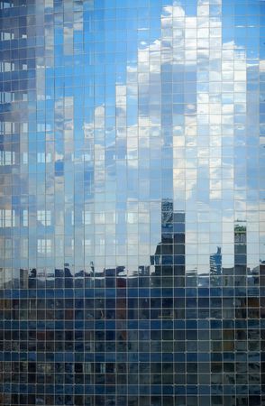 Glass wall of modern beautiful building in Kiev. Fragmented reflection.の写真素材