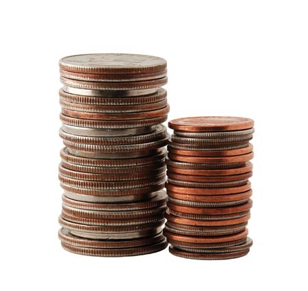 Two piles of coins isolated on white background, sideways