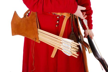 A lather quiver with arrows is hung on man in red caftan. Hands of warrior are holding a bow with a...