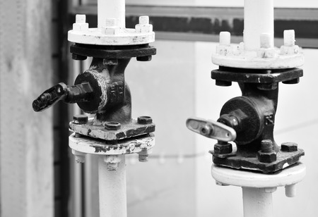 A valve is a device that regulates, directs or controls the flow of a fluid の写真素材