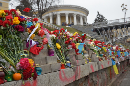 Kyiv, Ukraine - February 22 2015: Maidan are covered with flowers. Ukrainian capital is sorrowing over victims of the shooting at the Independence square in February 2014.のeditorial素材