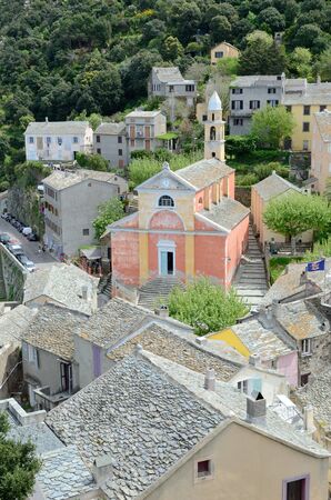 Nonza is one of the highlights of the Cap Corse shoreline. Ancient hamlet set high on the mountain covered with lush foliage.の写真素材