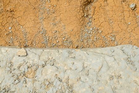 Clay earth and soil covered with dried silt
