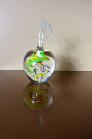 creative transparent glass apple in the interiorの写真素材