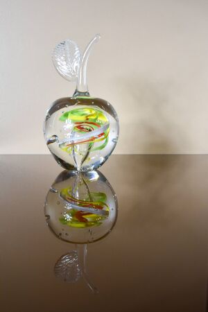 creative transparent glass apple in the interiorの写真素材