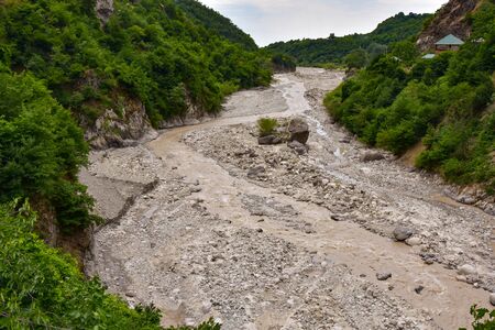 Mountain river on the way to the ancient center of handicraft production of copper utensils Lahich, Azerbaijanの写真素材