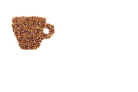 Roasted coffee beans placed in the form of a cup of coffee isolated on white backgroundの写真素材