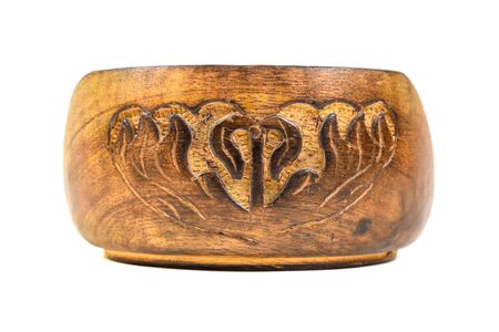 carved wooden coasters for beer mugs or tea isolated on white backgroundの写真素材