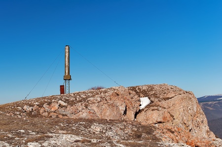 The old army antenna on Mount Chater Dag in Crimeaの写真素材