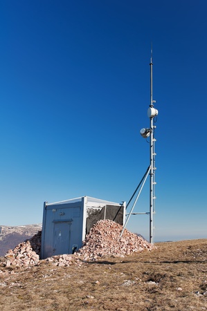 Antenna and a container with equipment on the mountain Chater Dag in Crimeaの写真素材