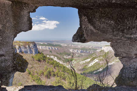 The ruins of a medieval fortress on the hill Mangup in Crimeaの写真素材