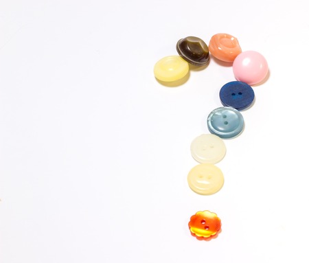arrangement of buttons on a white background,they are different in color and design,sewing industryの写真素材