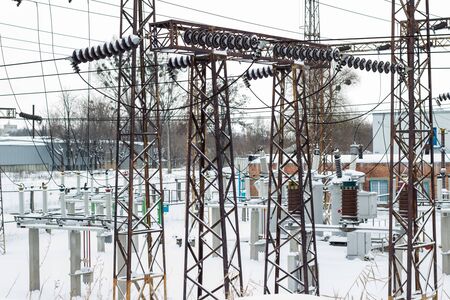 cityscape view of the power station on the street covered with snow all winter