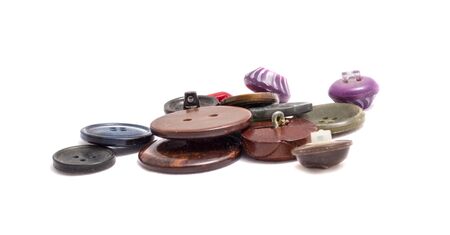 a scattering of buttons for clothing, a variety of bright and beautiful plastic