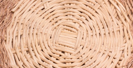Background braided basket, very pretty, wooden bars textureの写真素材
