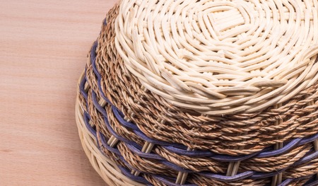 Background braided basket, very pretty, wooden bars textureの写真素材