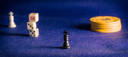 poker chips on a background of the fabric items for playing cards, are given for a win, are cash equivalent bankの写真素材