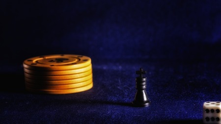 poker chips on a background of the fabric items for playing cards, are given for a win, are cash equivalent bankの写真素材