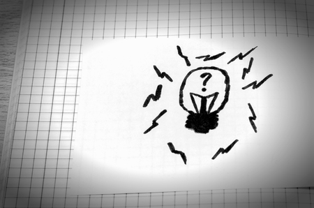 Painted lamp with a question mark inside this picture symbolizes the generation of ideas a question in what kind of thoughts are chaotically located aroundの写真素材