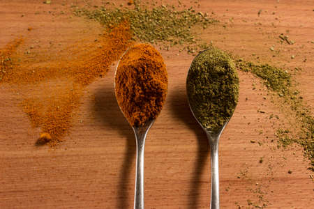 spicy seasonings on metal spoons red pepper and Georgianの写真素材