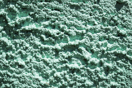 bright rough texture of a putty closeup grunge background for designの写真素材