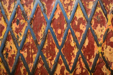 bright metal texture with patterns and flaking paint grunge background for designの写真素材