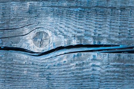 mysterious blue wood texture with beautiful round pattern and long crack background for designの写真素材