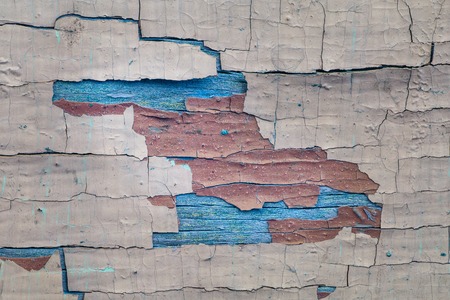 bright artistic multicolored wood texture with ripped paint background for designの写真素材