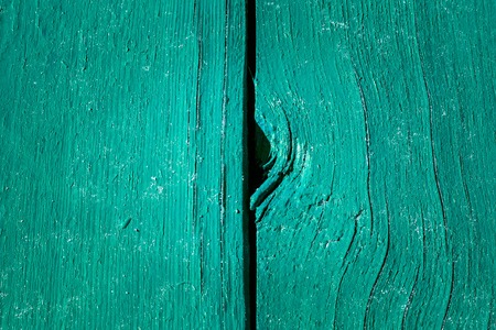 Mysterious wooden texture with bright center and dark edges Background for designの写真素材