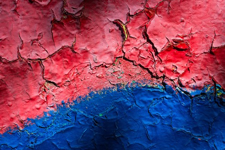 bright and multi-colored metal texture with dark cracks exciting patterns on the old wall grunge...