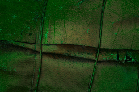 fantastic green texture of old fiberglass covering metal tube mystical industrial background for designの写真素材