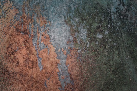 grunge metal texture covered with multicolored partially peeled paint closeup grunge background for...