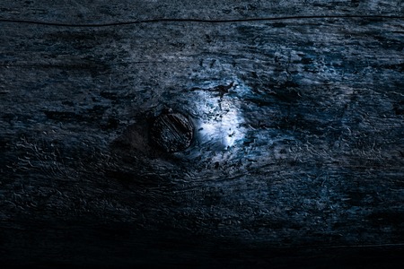dark blue wood texture mysterious and with glitter in the middle natural background for designの写真素材