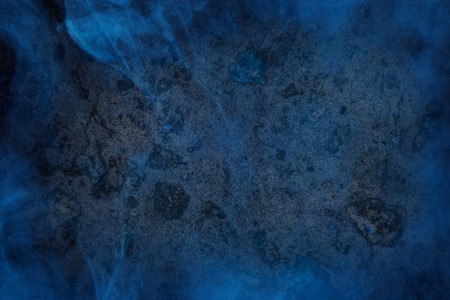 blue mystical fog covers gray stone surface background for design concept of mysteryの写真素材