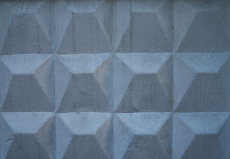 texture of a concrete slab with shapes in the form of a gray rhombus