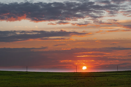 the sky at sunset far outside the city in an open field. High quality photoの写真素材