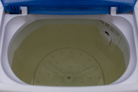 washing machine tank filled with clean water. High quality photoの写真素材