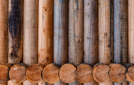 fragment of the wall of a wooden log house. High quality photoの写真素材