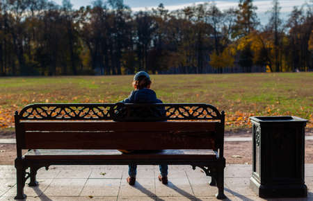 Moscow, Russia - October 20, 2021: Tsaritsino park, the man on the bench. High quality photoのeditorial素材