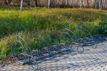 parking lot for bicycles in the park. High quality photo