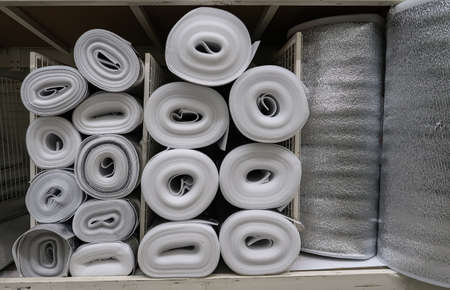 the utilizer rolled into a roll lies on the rack. High quality photoの写真素材