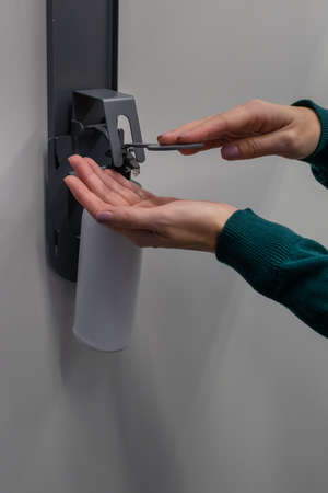 antiseptic balloon from which the hand squeezes out the contents. High quality photoの写真素材